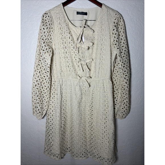 Zesica Dresses & Skirts - NWT Beige Zesica Long Sleeve Mini Babydoll Dress Tie Front‎ Eyelet, Large
